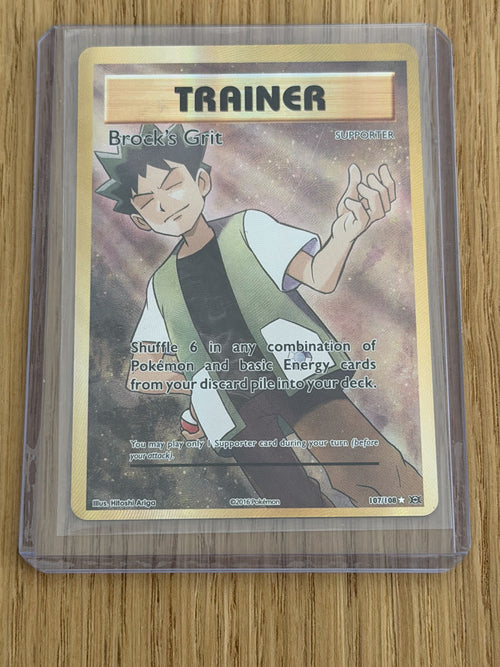 Brock's Grit 107/108 full art trainer - raw front